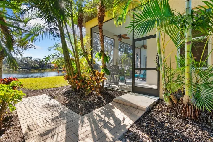 View of patio / terrace with a water view and ceiling fan