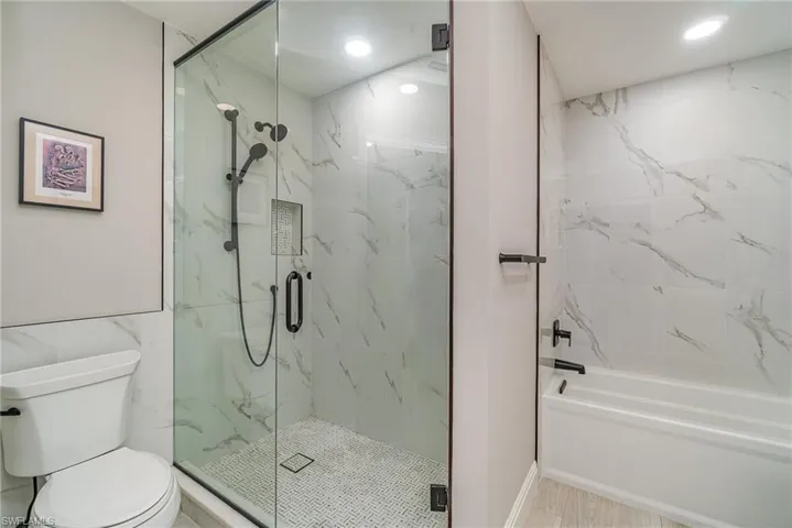 Primary Bathroom with separate walk-in shower and tub