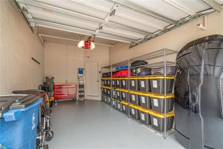 Garage featuring a metal shelves
