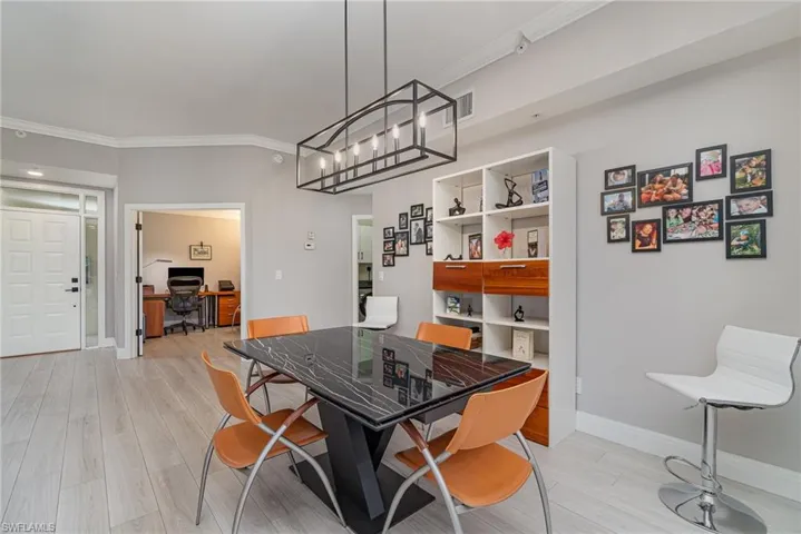 Dining area featuring beautiful light fixture