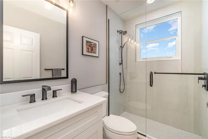 Guest Bathroom with updated vanity and walk-in shower
