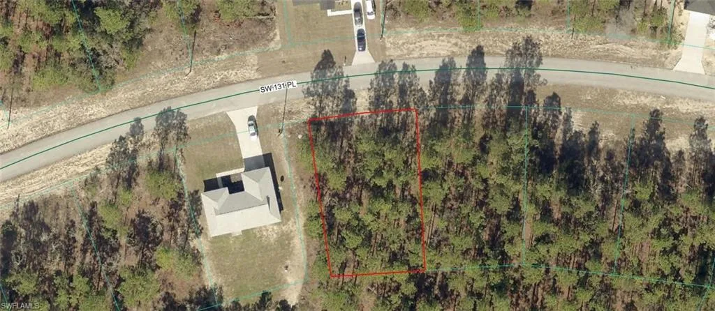 Aerial View of Property. Displaying the property boundaries and surrounding area