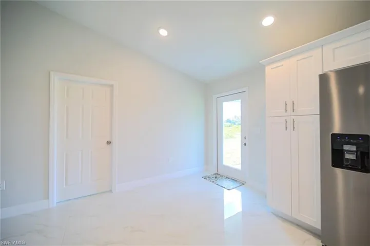 the Glass Door In The Dining Area Helps Light Up The Entire Home!