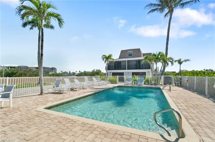 Community pool featuring a patio area