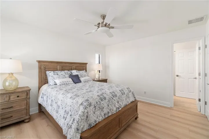 Bedroom featuring light wood finished floors and ceiling fan