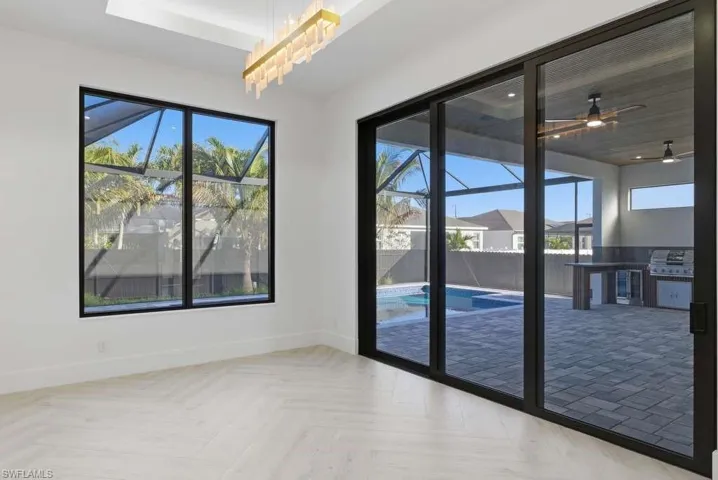 Entryway featuring parquet flooring and ceiling fan