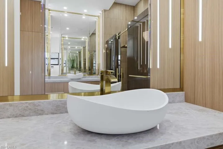 Full bath featuring vanity and recessed lighting
