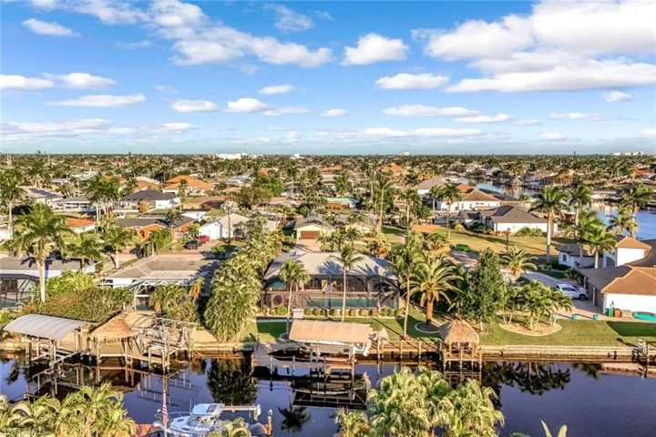 Aerial view of residential area with a large body of water