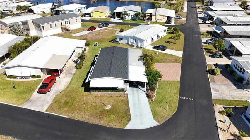 Aerial view with a residential view and a water view
