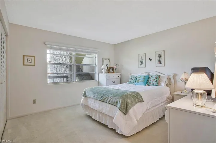 Primary Bedroom features and an on-suite with a step in shower and a walk in closet