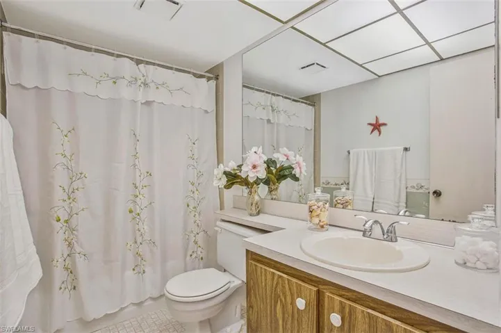 Full bath featuring a tub and shower combination.