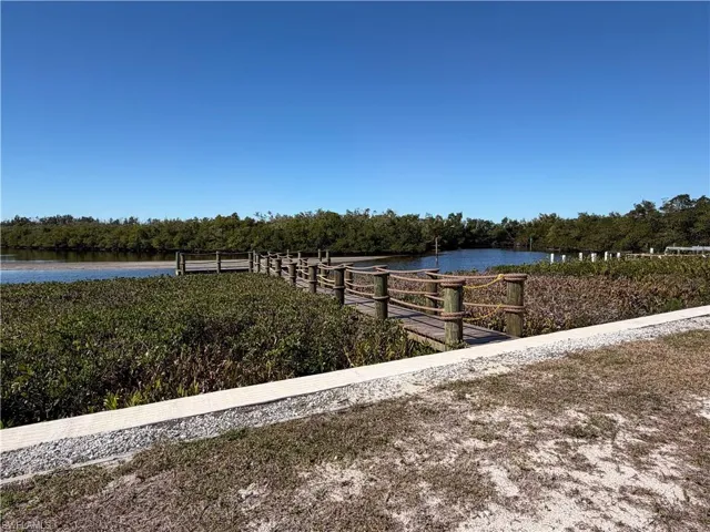 Dock featuring a water/bay view