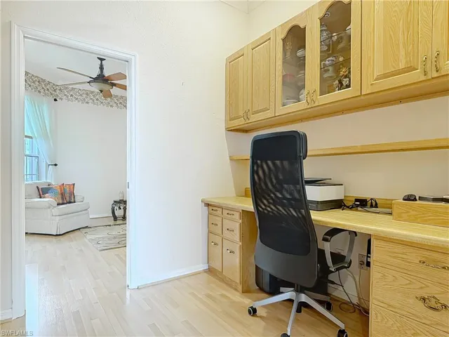 Wall to Wall cabinets on back wall, not photographed