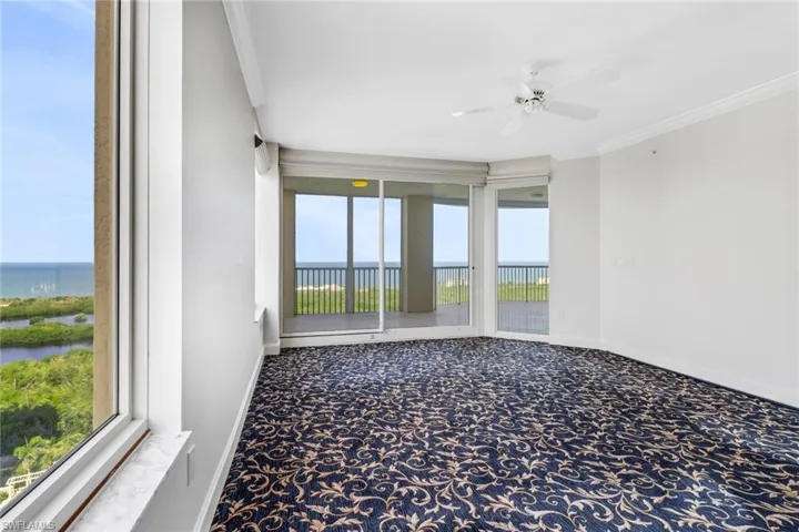 Primary Bedroom in SW Corner w/access to balcony