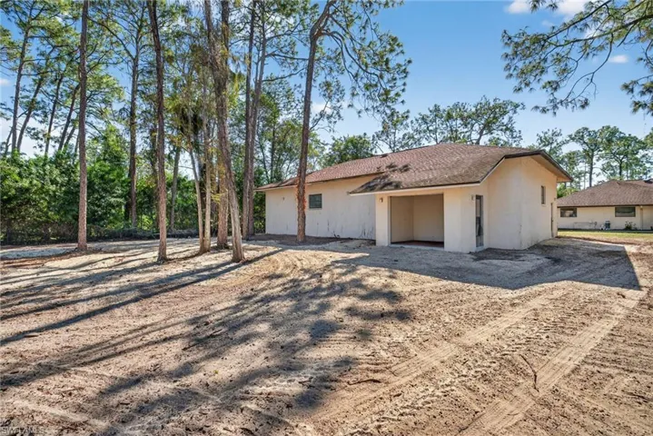 View of front of home featuring stucco siding
