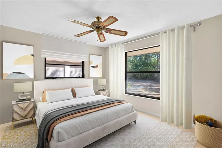 Virtually Staged Bedroom featuring baseboards and a ceiling fan