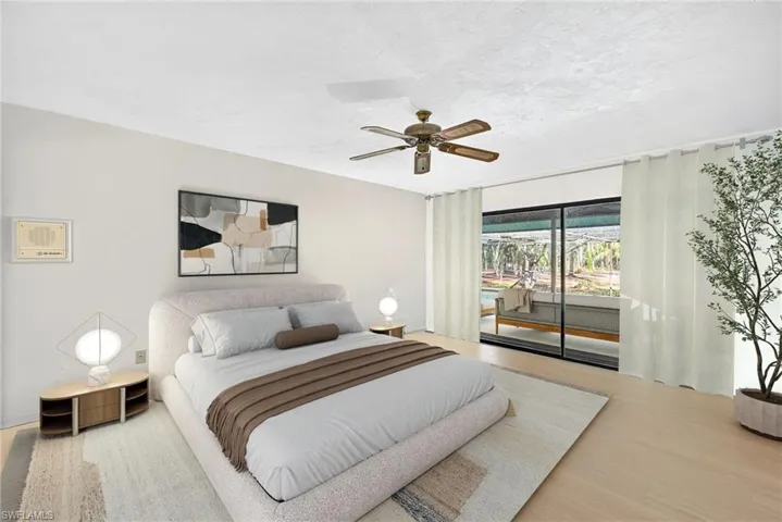 Virtually Staged Bedroom featuring access to outside, wood finished floors, ceiling fan, a textured ceiling, and a wall of windows