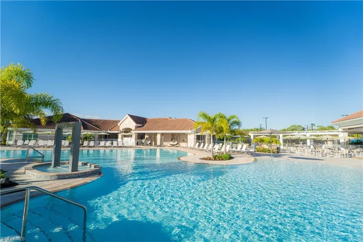 Community pool with a patio area