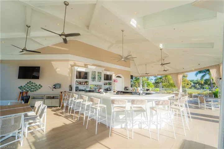 Kitchen with vaulted ceiling and recessed lighting