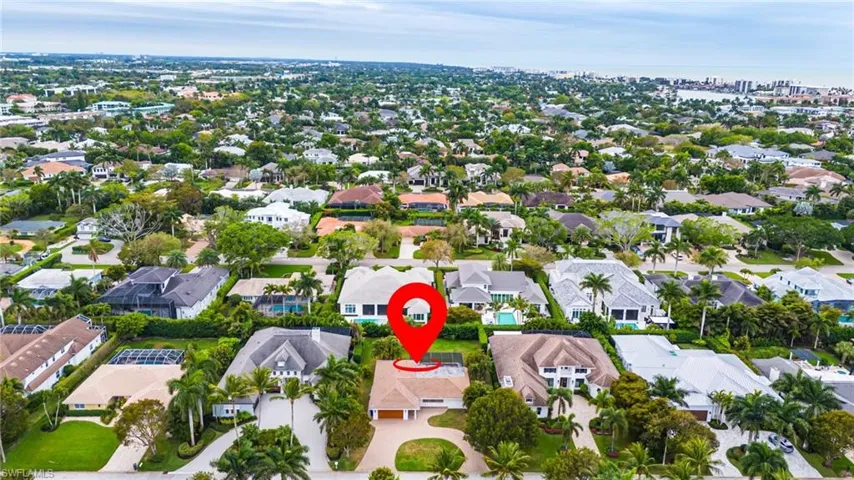 Setting on lovely tree lined street surrounded by luxury new construction.