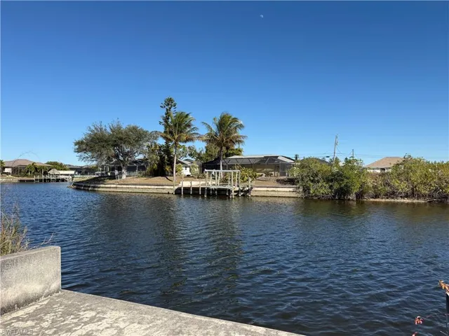 Water view with a boat dock