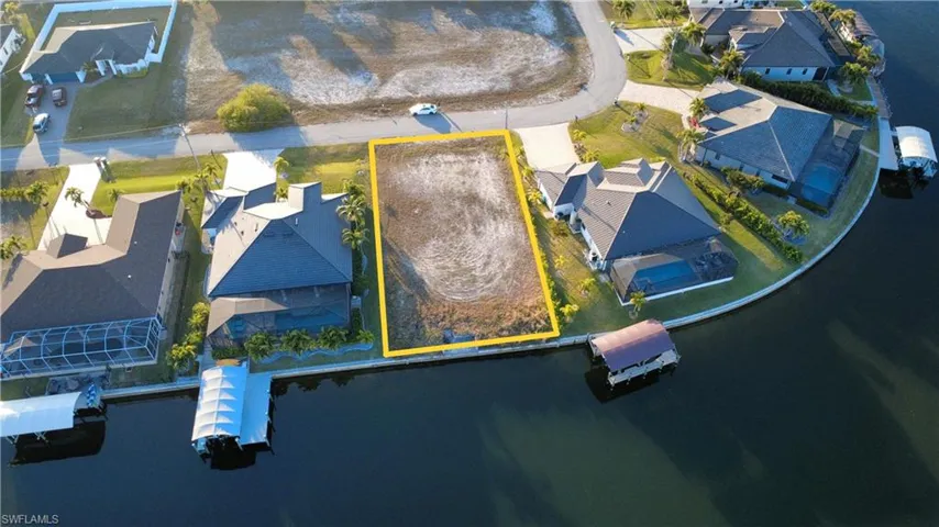 Aerial perspective of suburban area with property parcel outlined
