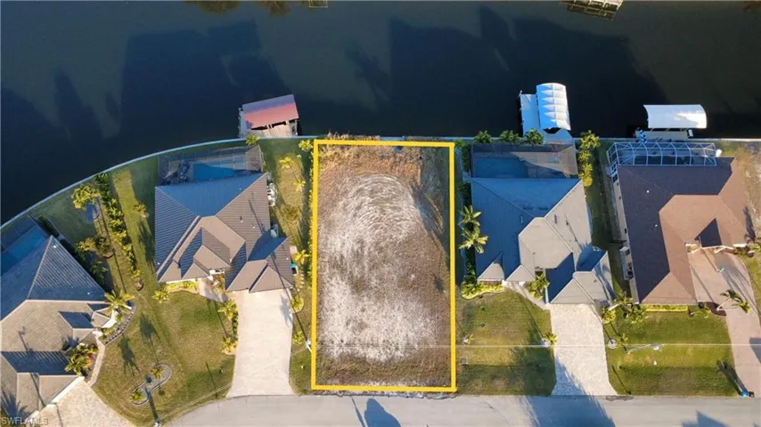 Aerial perspective of suburban area with property boundaries highlighted