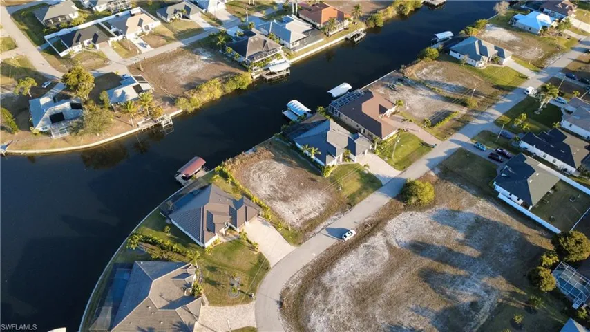 Aerial overview of property's location with nearby suburban area