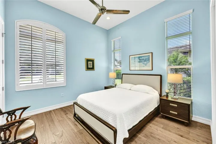 Bedroom featuring light wood-type flooring and ceiling fan