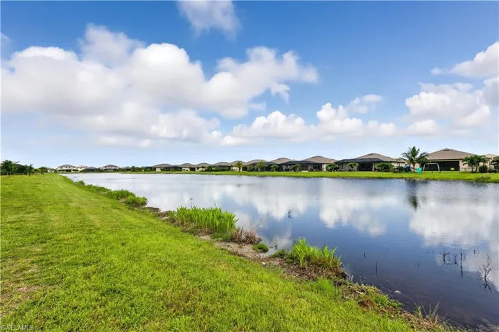 Water view featuring nearby suburban area