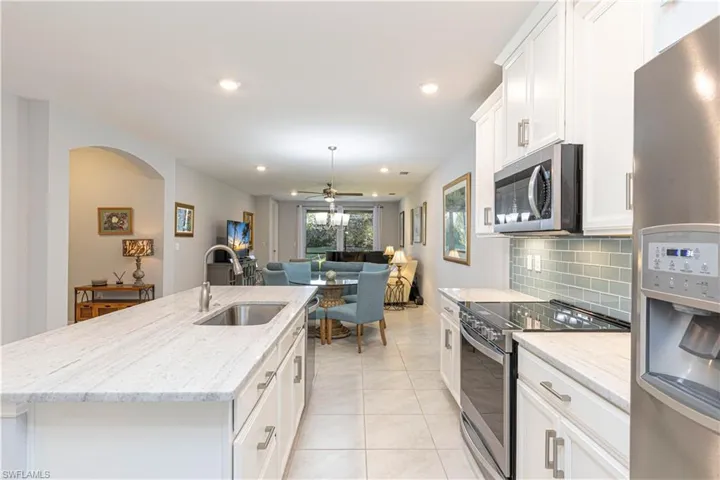Graite Countertops and Whirlpool Stainless Steel Appliances