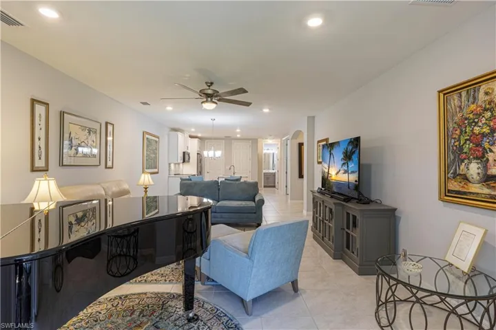 Living area large enough to fit a grand piano