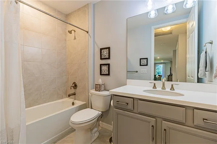 Guest Bathroom with tub and nice vanity