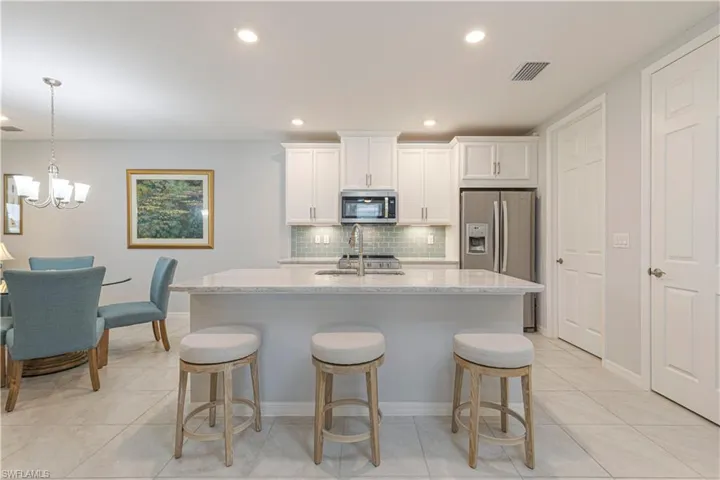 Coastal Kitchen with Granite Counters and large island