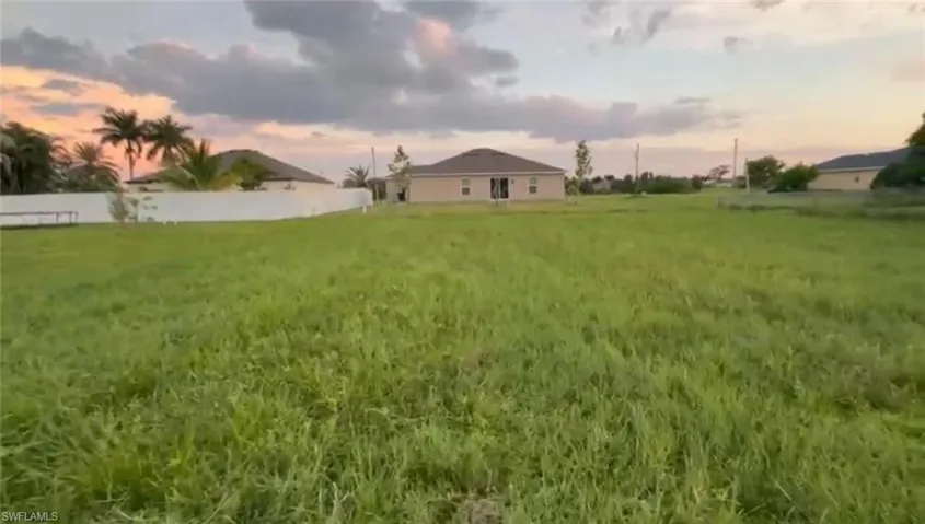 View of yard at dusk