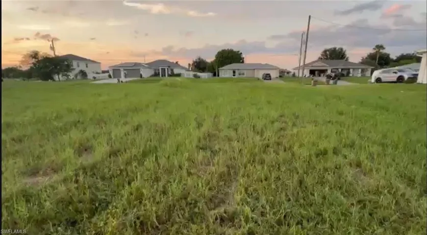 View of yard at dusk