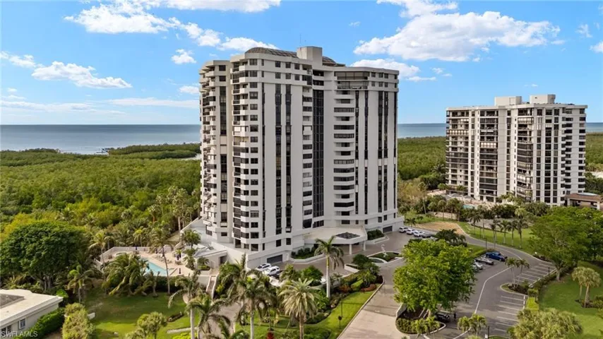 View of apartment building / complex with a water view