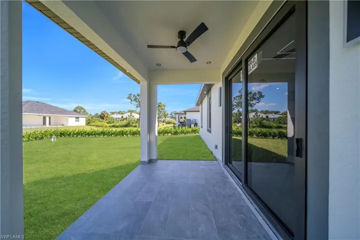 View of patio / terrace with a ceiling fan