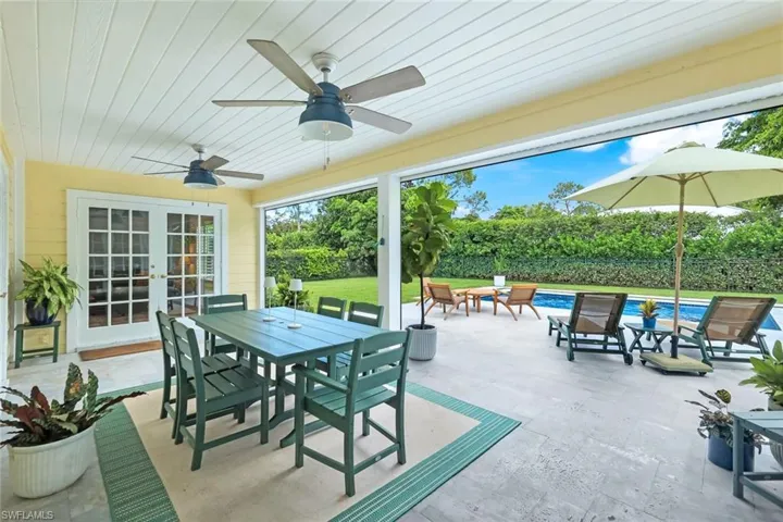 Covered lanai with electric storm shutters