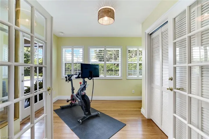 Den off the master bedroom with doors to the lanai