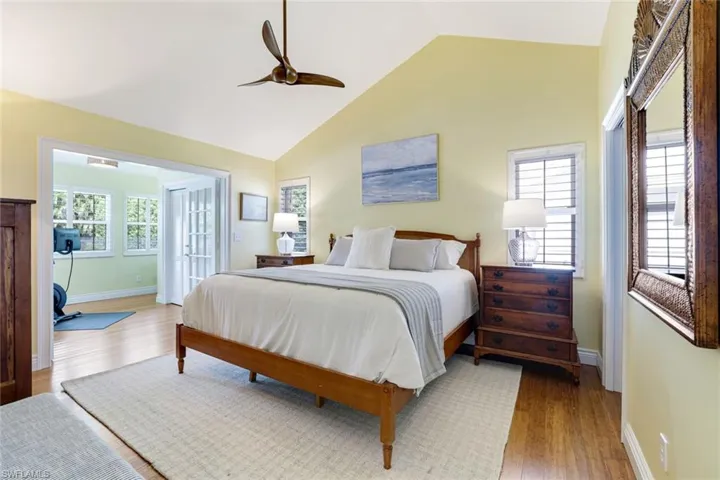 Master bedroom accompanied by a den, walk-in closet, and full bath