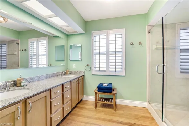 Master bath with dual sinks and step-in shower