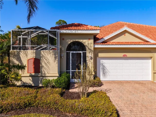 Streetside entry with courtyard facing entry and 2 car garage view