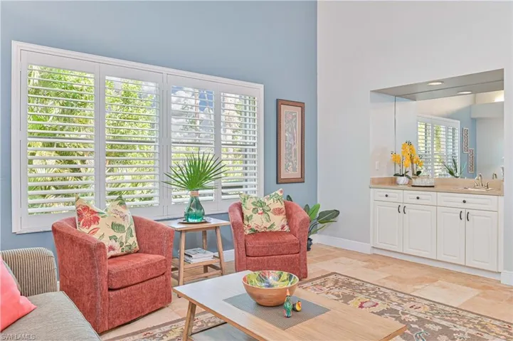 Living area featuring baseboards