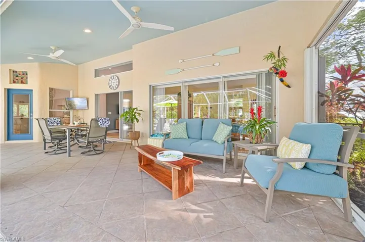 View of patio / terrace with a ceiling fan, outdoor lounge area, and a fire pit
