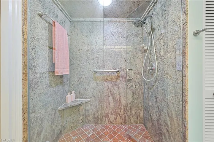 Bathroom featuring a shower stall