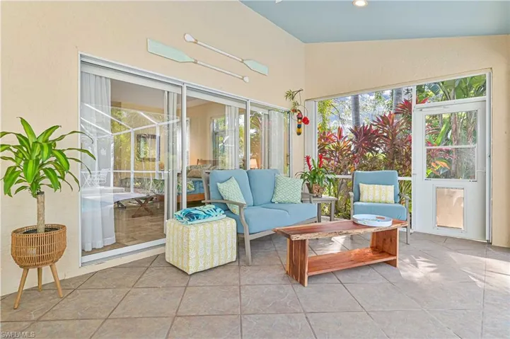 Sunroom featuring tile patterned flooring