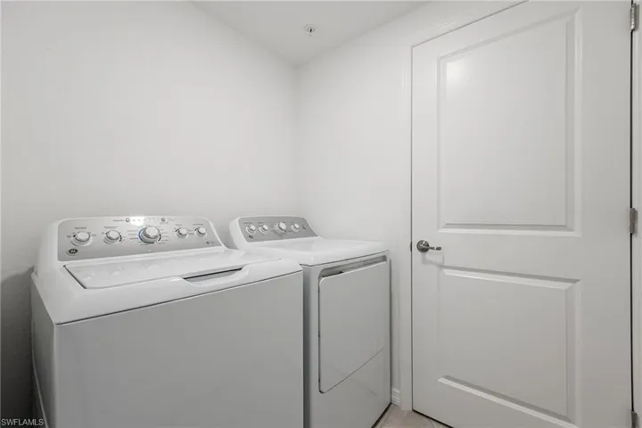 Laundry area featuring washing machine & dryer