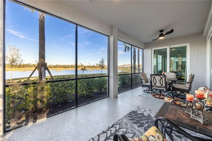 Screened lanai with tranquil views of the lake