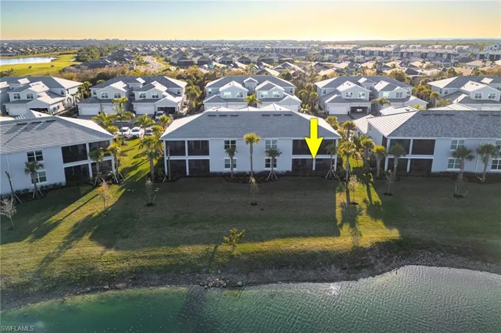 Aerial view of back of condo overlooking the lake
